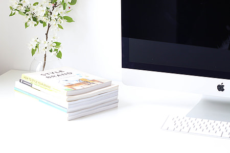 white book on white table top thumbnail