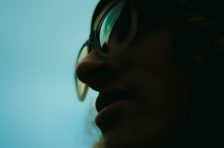 person wearing eyeglasses with white frames thumbnail