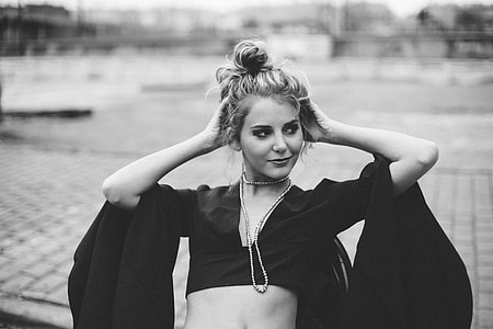 woman holding her hair thumbnail