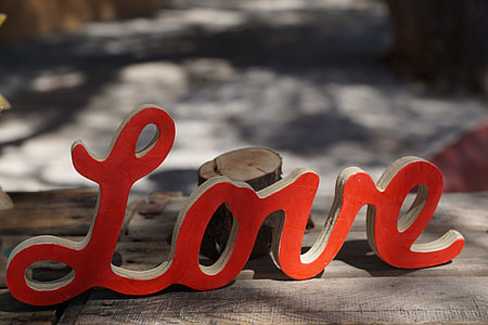 Love decor on wooden surface thumbnail