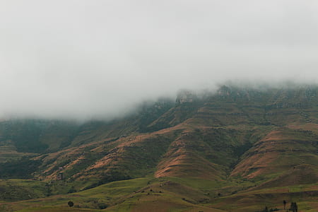 mountain under cloudy sky thumbnail