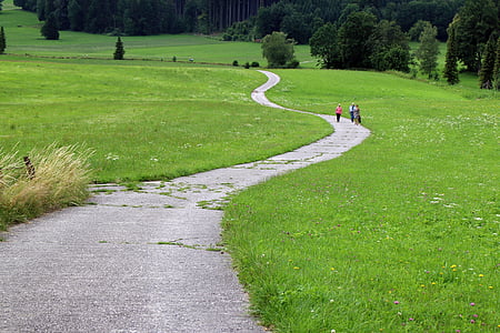 three person walking on farm land thumbnail