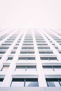 low angle photography of white building thumbnail