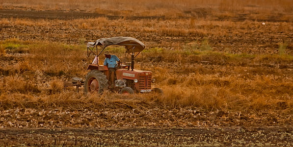 farm tractor in field thumbnail