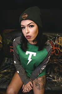 Woman Wearing Green and Gray Jacket thumbnail