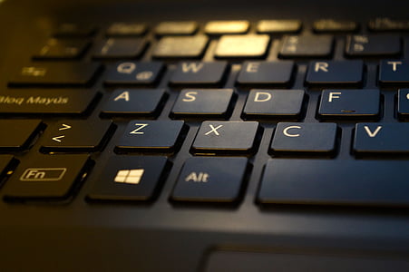 black keyboard keys in selective focus photo thumbnail