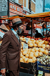 man wearing brown notched lapel suit jacket thumbnail