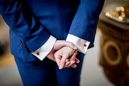 Person Wearing Blue Suit Jacket thumbnail
