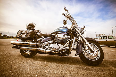 shallow focus photography of blue touring motorcycle thumbnail