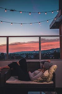 man lying on couch thumbnail