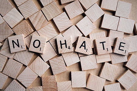 brown wooden No Hate puzzle block lot thumbnail