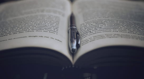 click pen on between book pages thumbnail