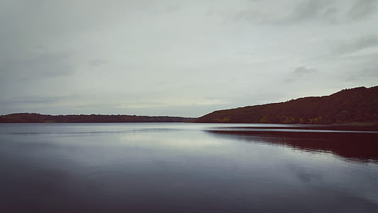 panoramic photo of black mountain during daytime thumbnail