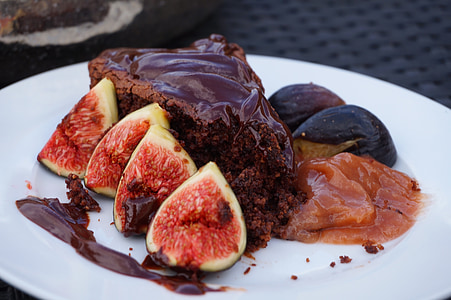 plate of sliced cake and pomegranate thumbnail