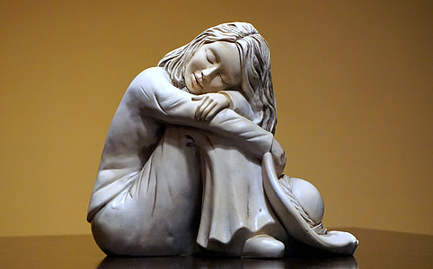 photo of woman wearing white dress figurine thumbnail