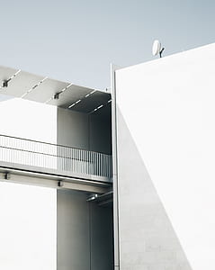 white bridge with building thumbnail