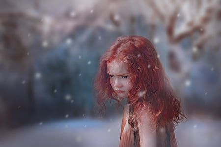red haired girl wearing brown sleeveless top thumbnail