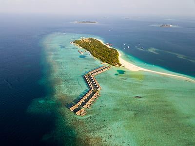 aerial photography of island surround by body of water thumbnail