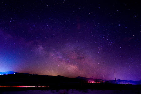 silhouette mountain under purple sky thumbnail