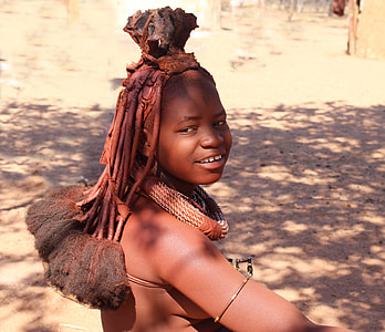 child wearing traditional headpiece and necklace thumbnail
