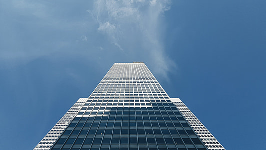 white and blue building under clear sky thumbnail