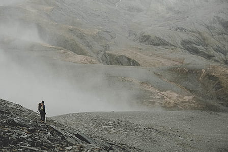 man in gray field thumbnail