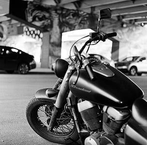 grayscale photo of parked cruiser motorcycle thumbnail