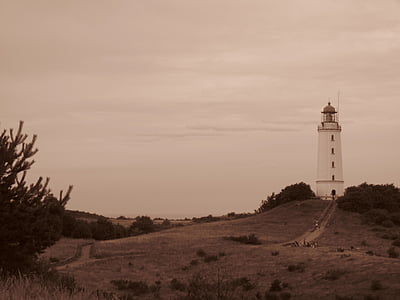 photo of people walking towards white lighthouse thumbnail
