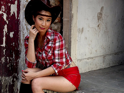 woman in red shorts sitting on floor thumbnail