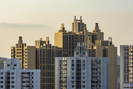 white and yellow city buildings thumbnail