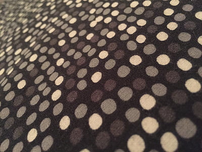 white and black polka-dot textile thumbnail