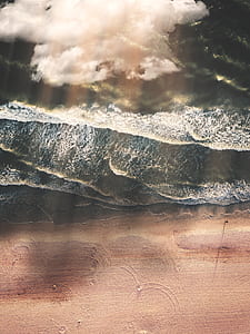 birds eye view photography of beach thumbnail