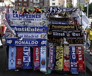 assorted-color soccer banner display on street thumbnail