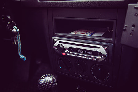 black and gray 1-DIN vehicle stereo thumbnail