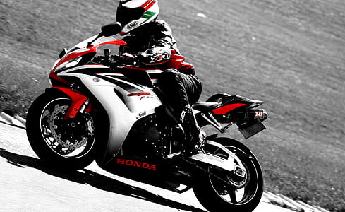 man riding on Honda sports bike thumbnail