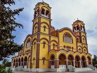 Yellow and Brown Cathedral Under Blue Sky thumbnail