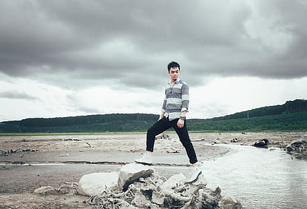 Person Wearing Gray and White Sweater thumbnail