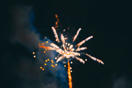 orange and white fireworks on sky thumbnail