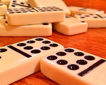 selective focus photography of domino tiles thumbnail