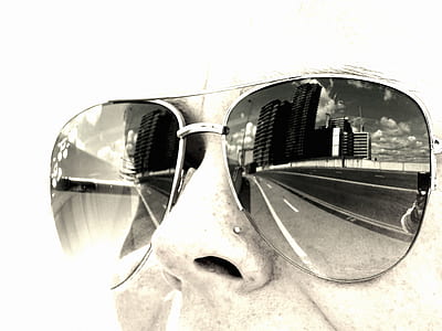 sky, sunglasses, clouds, buildings thumbnail