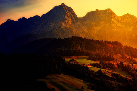 aerial photography of brown mountains during sunset thumbnail