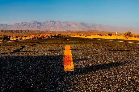 concrete road during daytime thumbnail