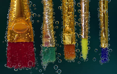 five gold-colored brushes thumbnail