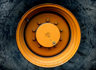 yellow vehicle wheel with tire thumbnail