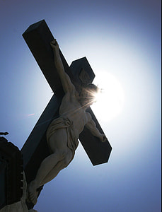 Crucifix statue photo during daytime thumbnail