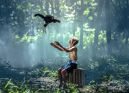 man wearing blue shorts thumbnail