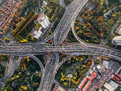 vehicles traveling on road aerial photo thumbnail