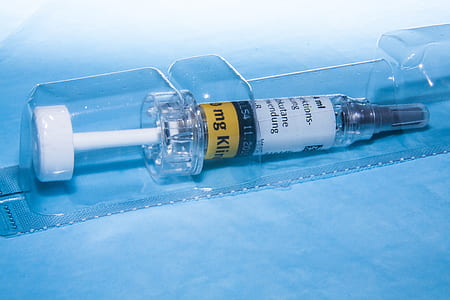 close-up photography of clear and white syringe thumbnail