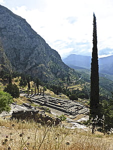 brown structure beside rock mountain thumbnail