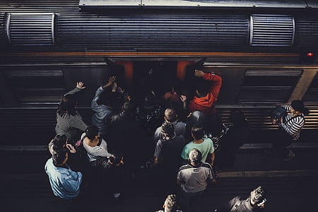 people rushing trying to enter train thumbnail